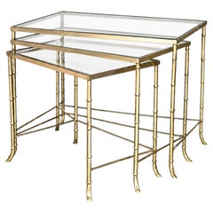A set of mid 20th Century Maison Jansen brass bamboo tables