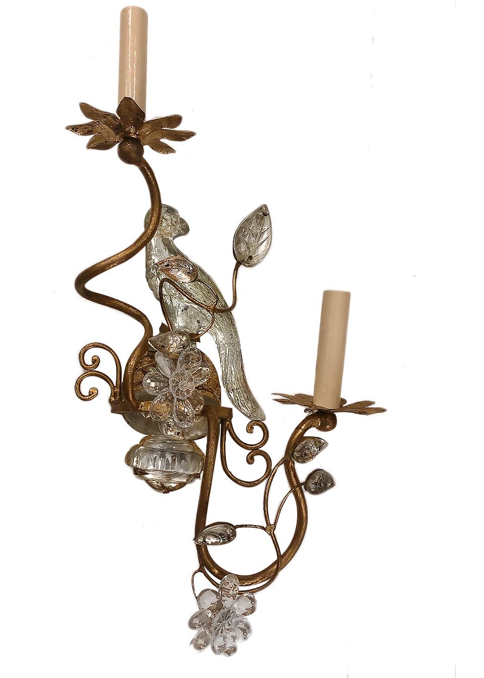 A set of four circa 1930s French gilt metal sconces with molded glass leaves and birds. Sold per pair.

Measurements:
Heigh 21