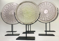 A set of mounted vintage automobile headlight glass Insert plates