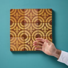 A Set of Nine Reclaimed Encaustic W.Godwin Tiles
