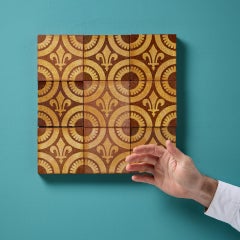 A Set of Nine Reclaimed Encaustic W.Godwin Tiles