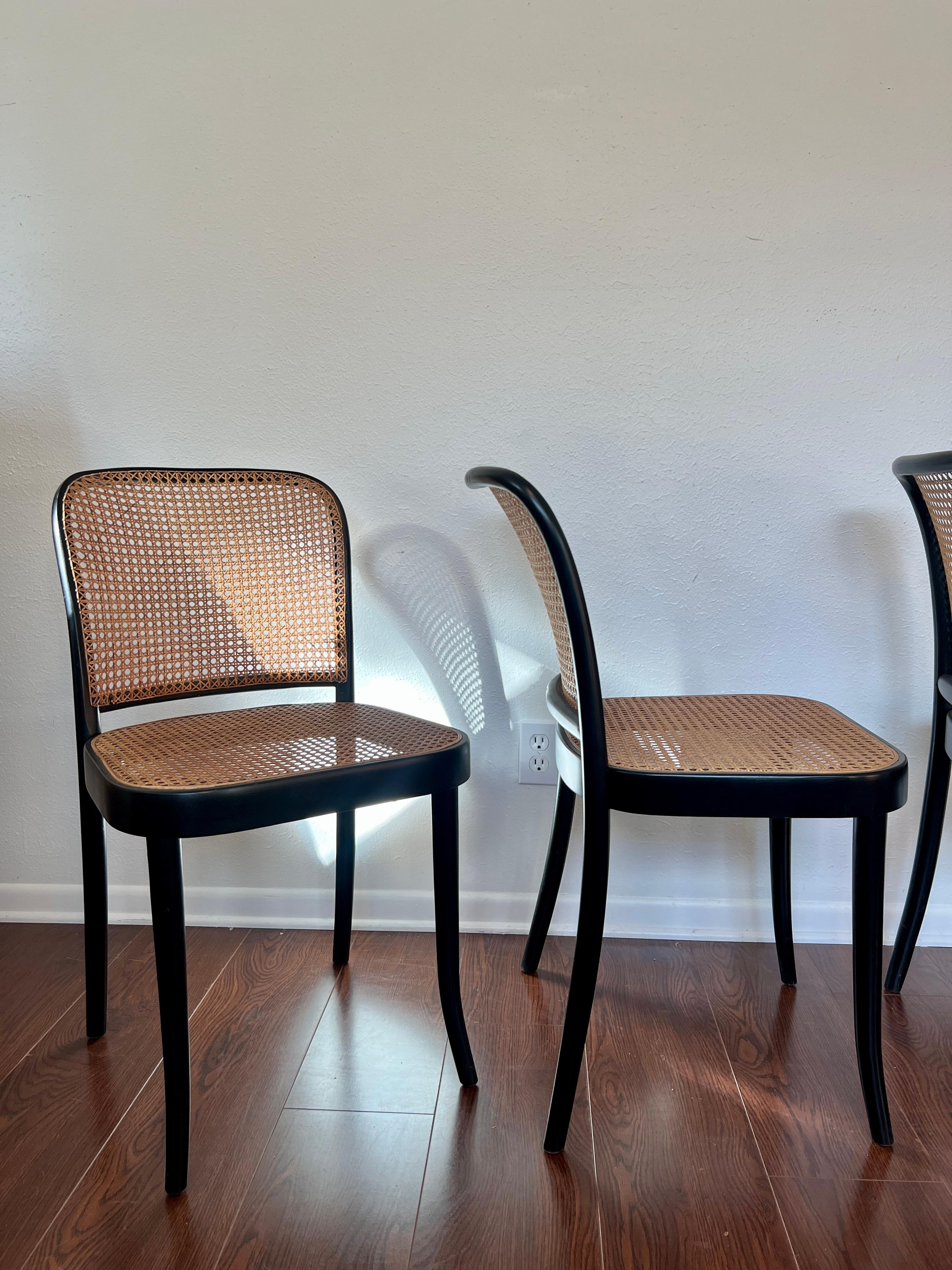A set of of 4 original chairs by Josef Hoffmann for Thonet, circa 1960s. Recently refurbished, the bentwood beech wood and cane back / seats are in excellent condition and chairs are structurally sound. Imported by Stendig, made in Czechoslovakia.