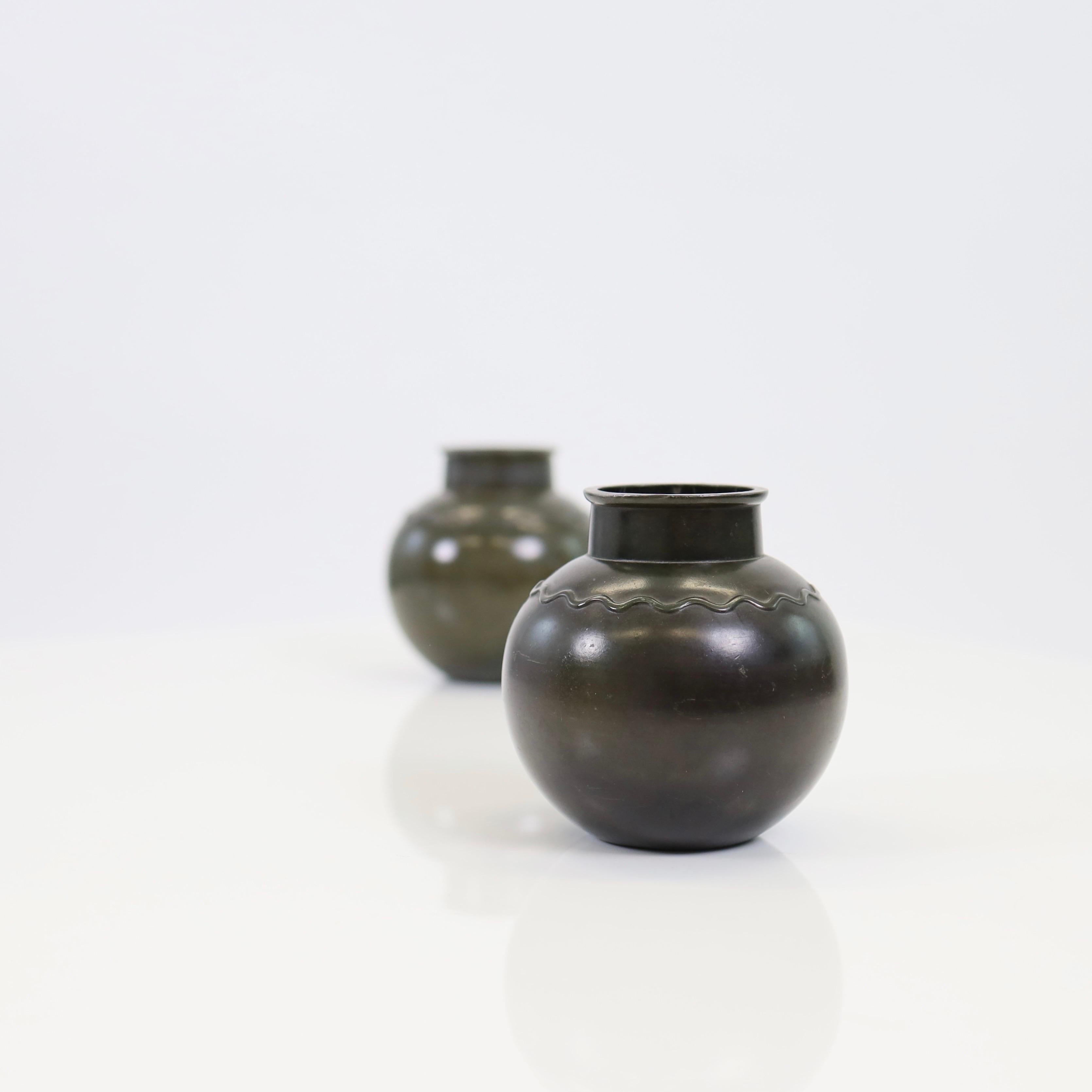 Mid-20th Century A set of round metal vases by Just Andersen, 1930s, Denmark For Sale