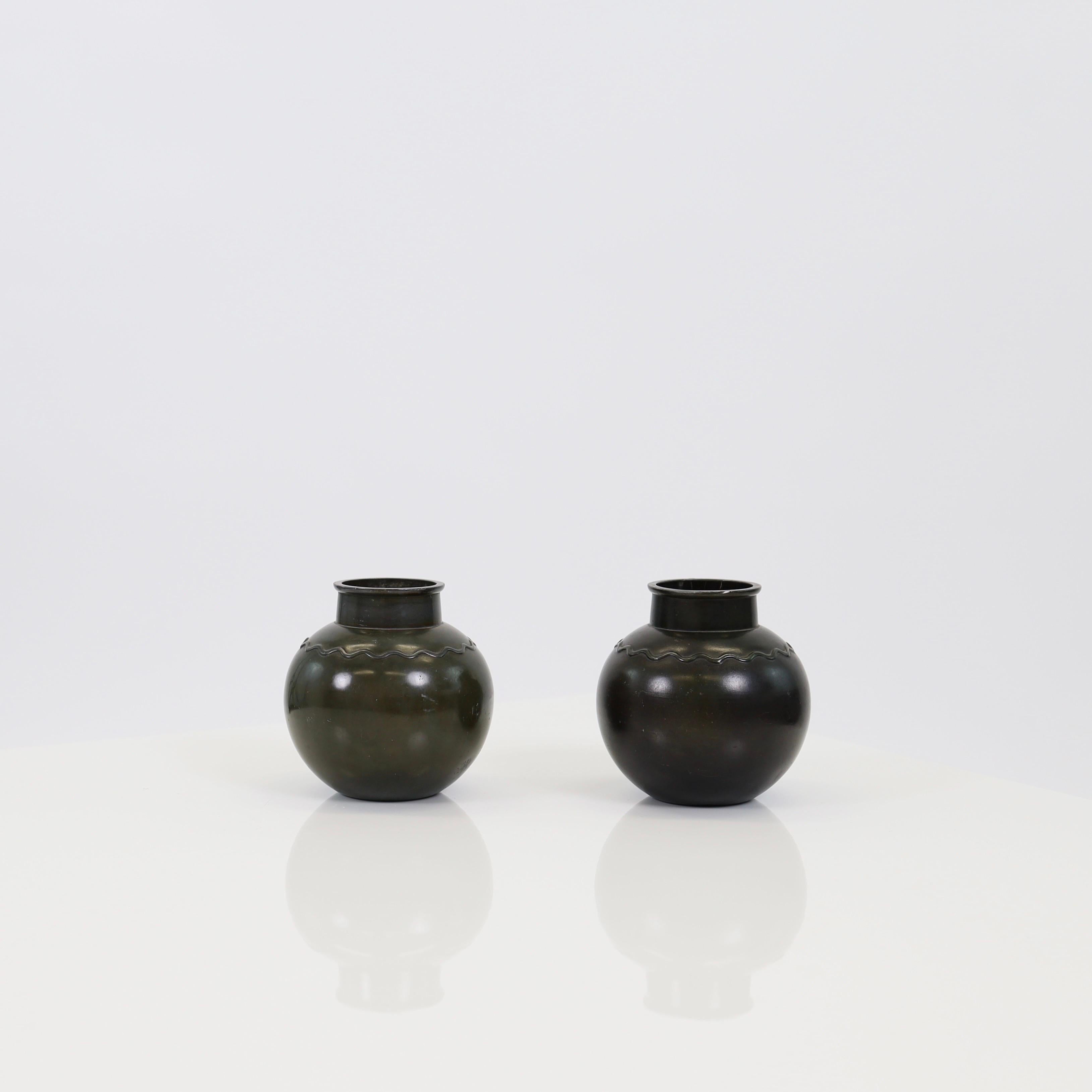 Metal A set of round metal vases by Just Andersen, 1930s, Denmark For Sale