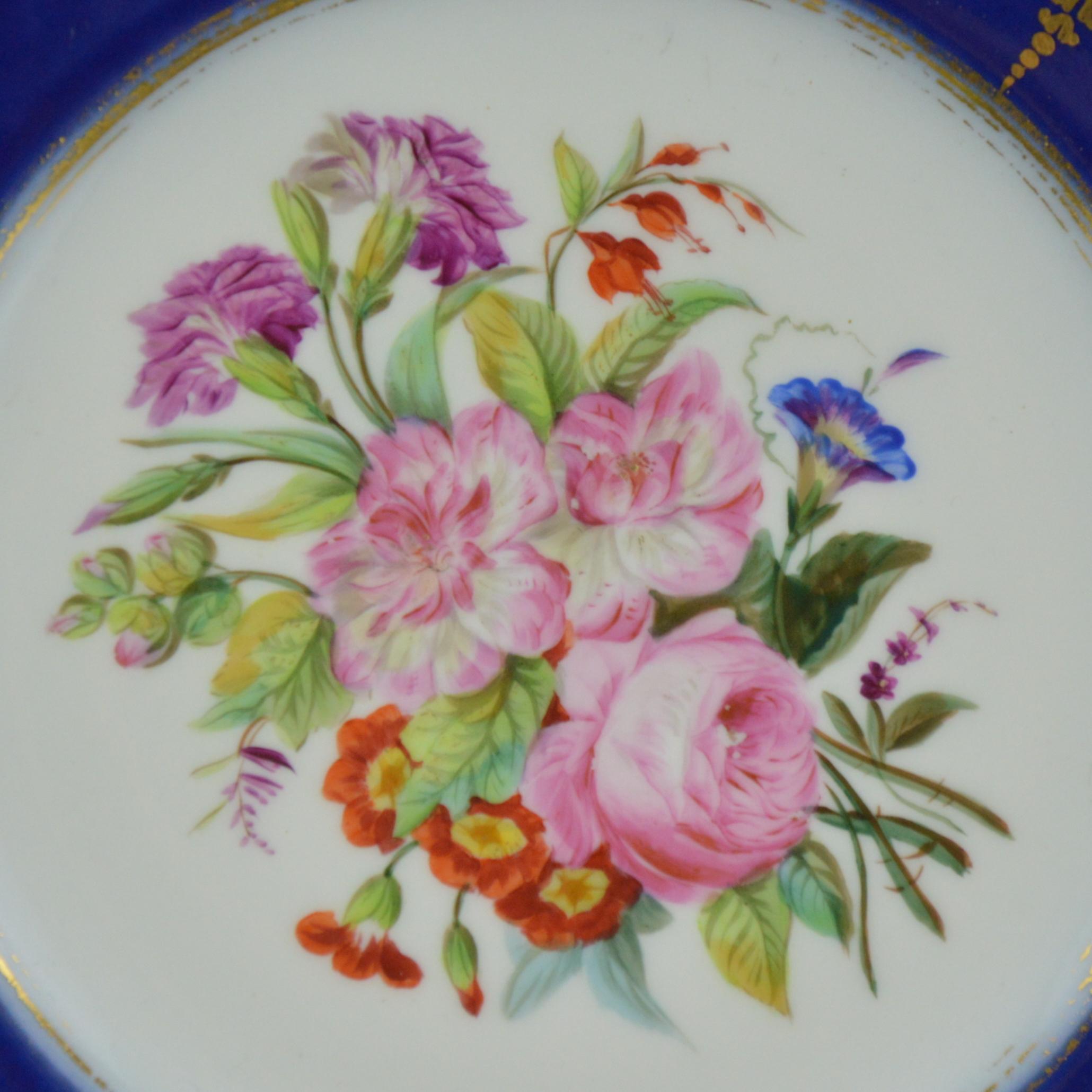 A set of six old Paris porcelain plates. Hand painted decoration representing a flowers bunches. Each plate has its own unique decoration. 