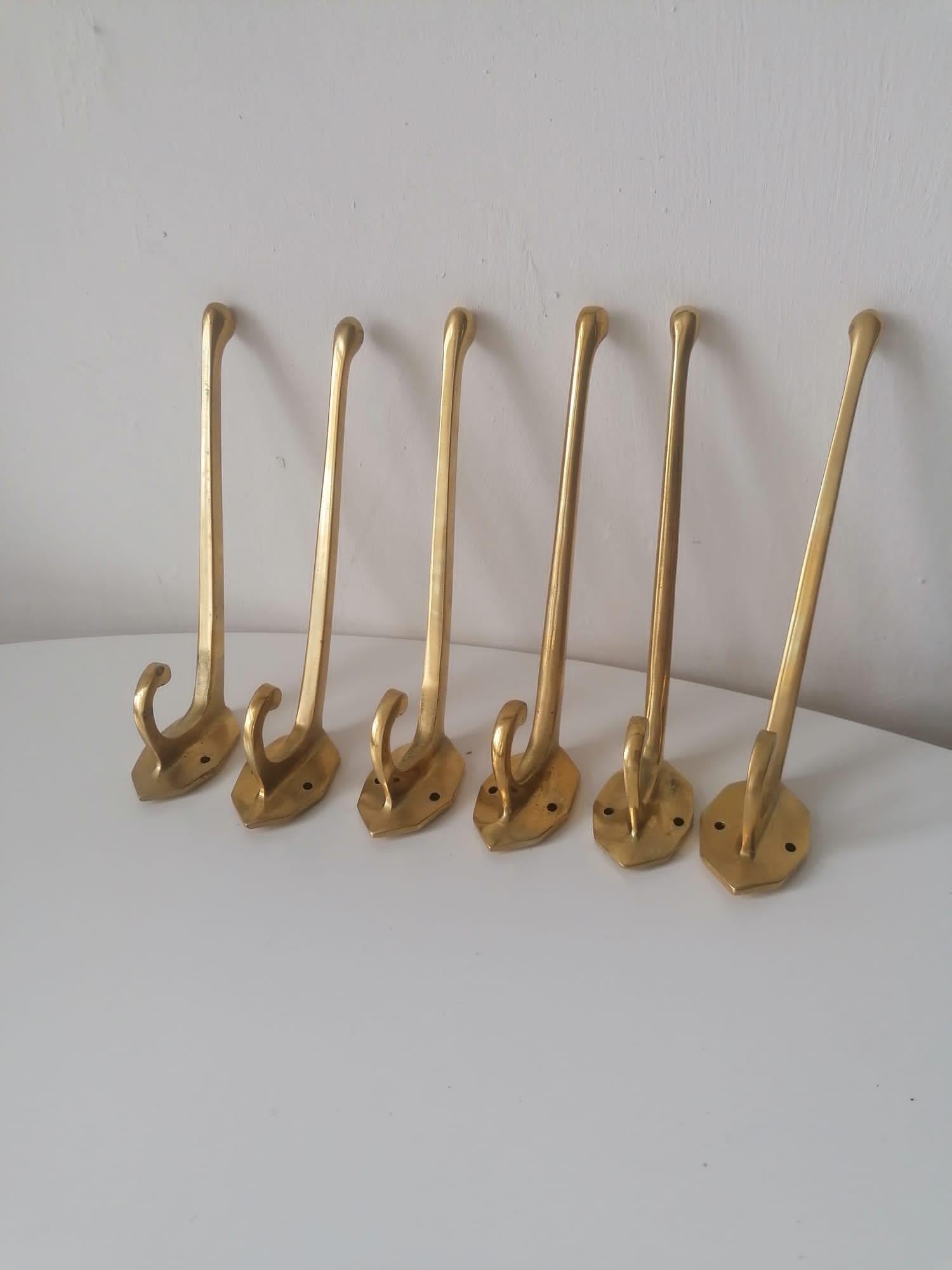 A Set of Six Art Nouveau Brass Coat Hooks For Sale 1