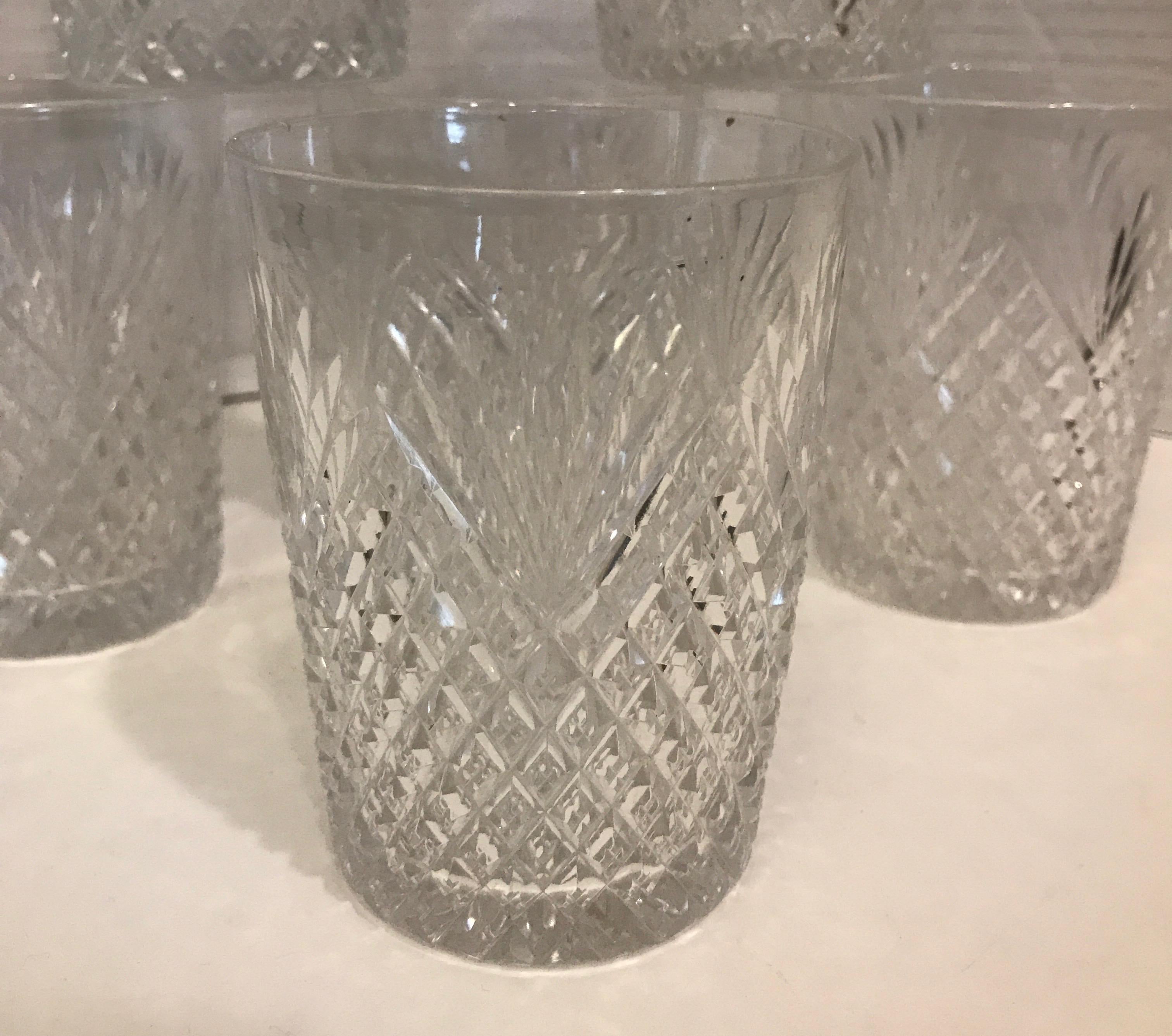 Six hand cut crystal diamond and fan pattern whisky rock glasses, The mirror shine cuts with mostly a diamond pattern with a fan cut at the top. These are individually made as the thickness of each glass is slightly different and the cuts are hand