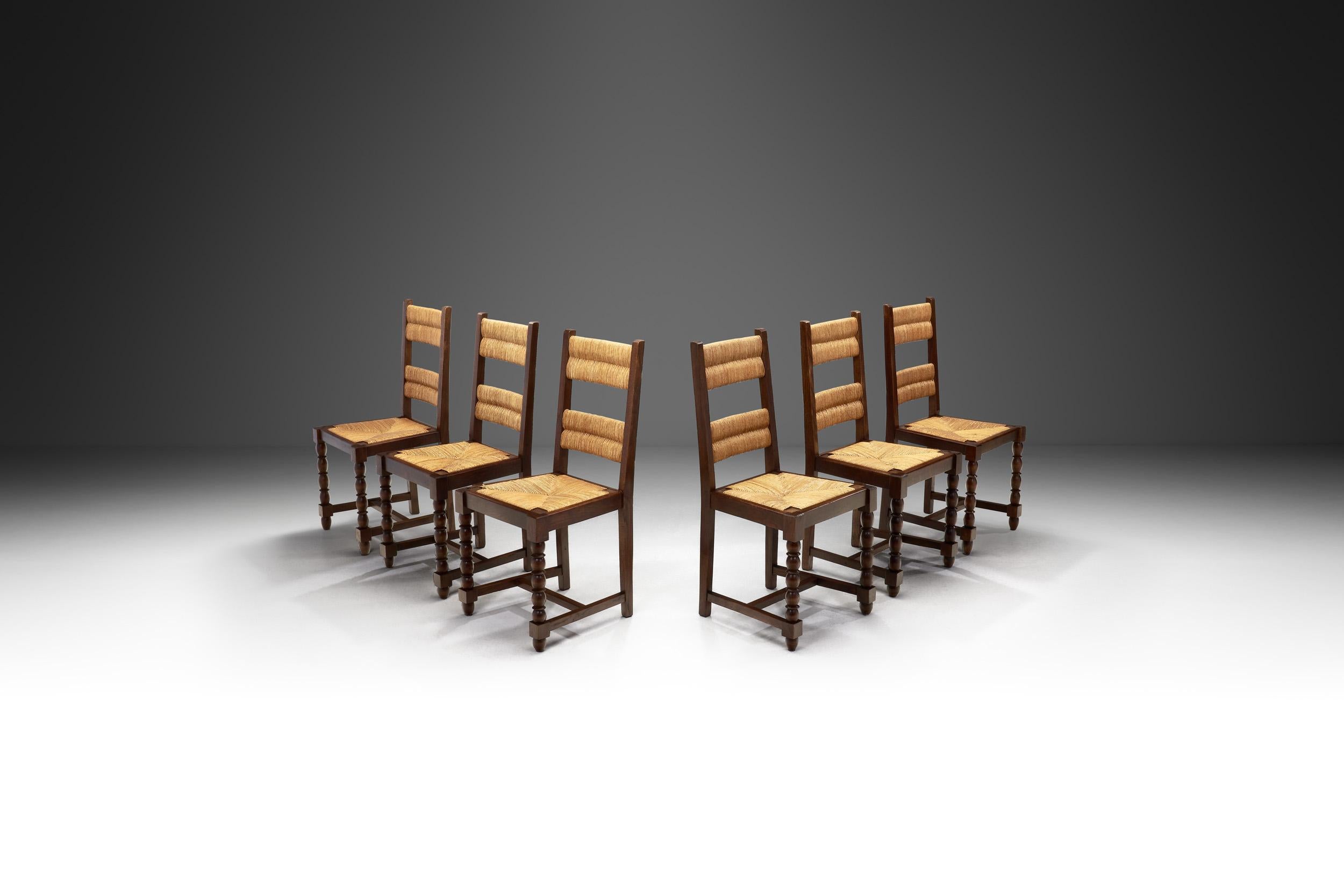 This charming set of six dining chairs was born from a desire to create a design that was comfortable, organic, and cosy in its simplicity. The design incorporates subtle, yet stunning decorative elements as the woven cane panels find architectural