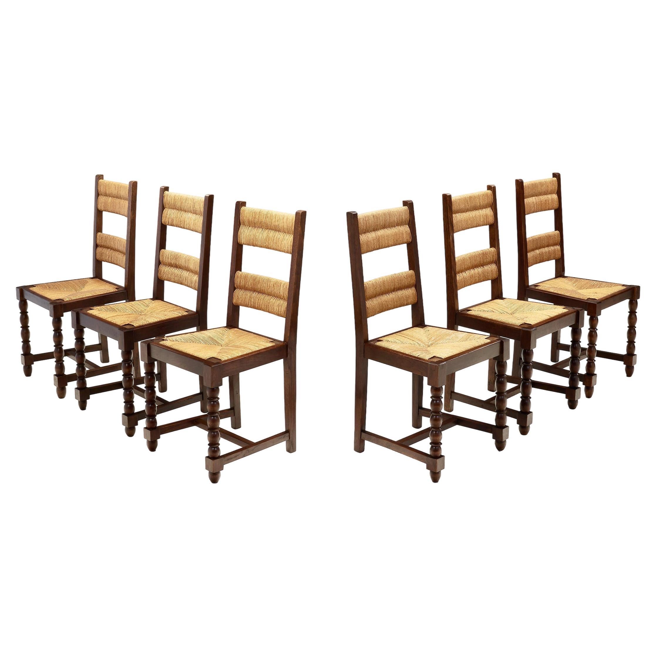 A Set of Six Cane and Wood Chairs with Sculptural Legs, Europe ca 1940s For Sale