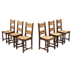 Vintage A Set of Six Cane and Wood Chairs with Sculptural Legs, Europe ca 1940s