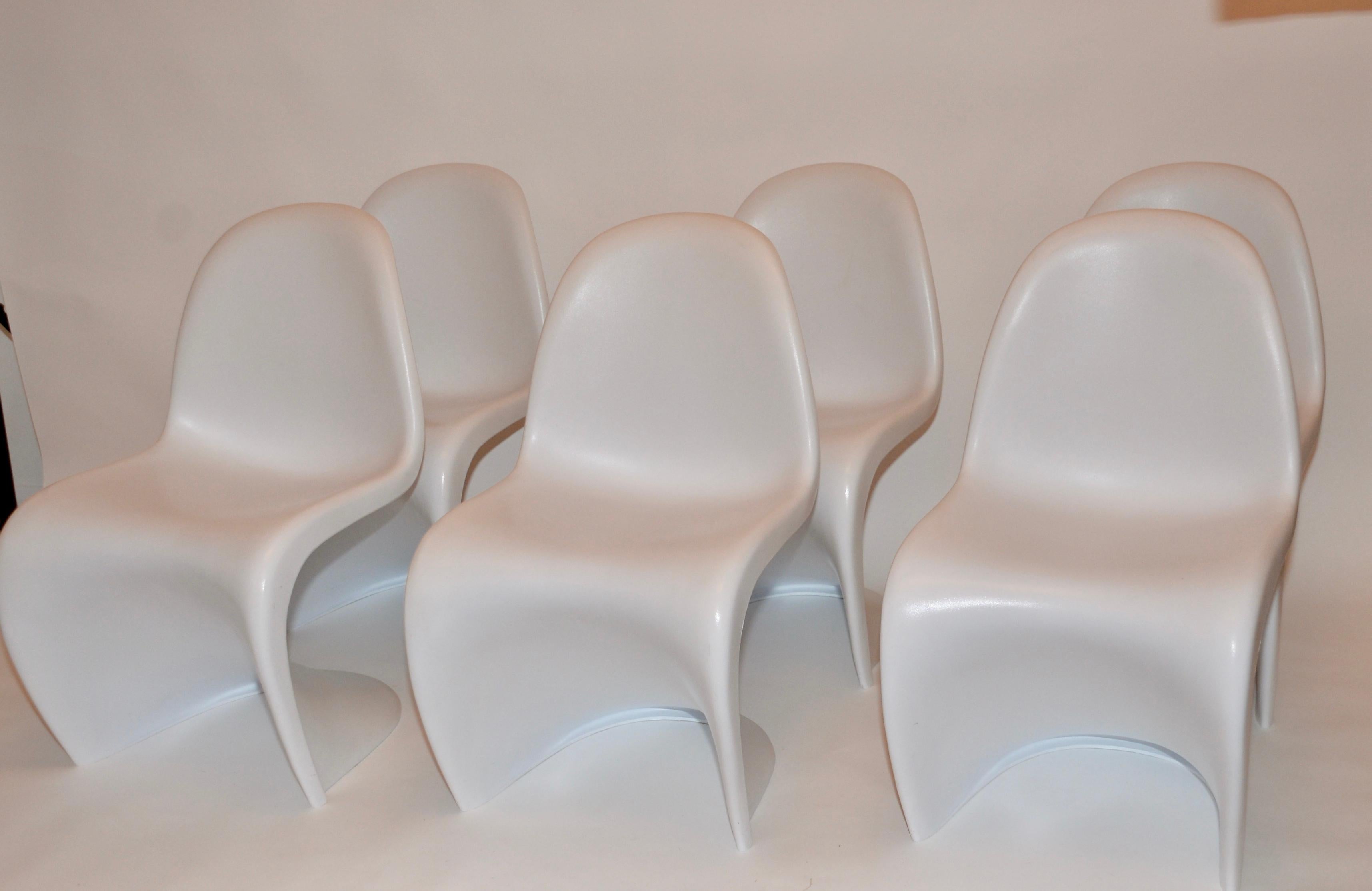 A set of six Verner Panton inspired S chairs. These are a replica of the original iconic white stacking chairs by the influential Danish designer Verner Panton. These cantilevered chairs are stackable and are a fabulous replica of the original
