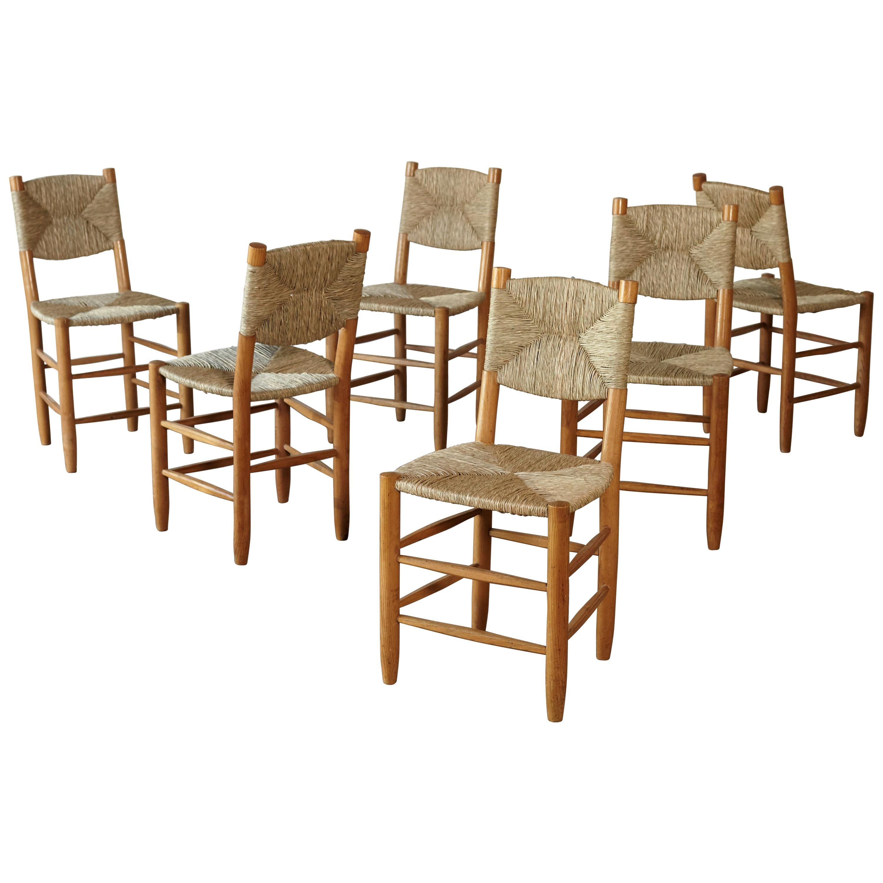 A set of six Charlotte Perriand Model 19 Bauche Chairs, France, 1950s