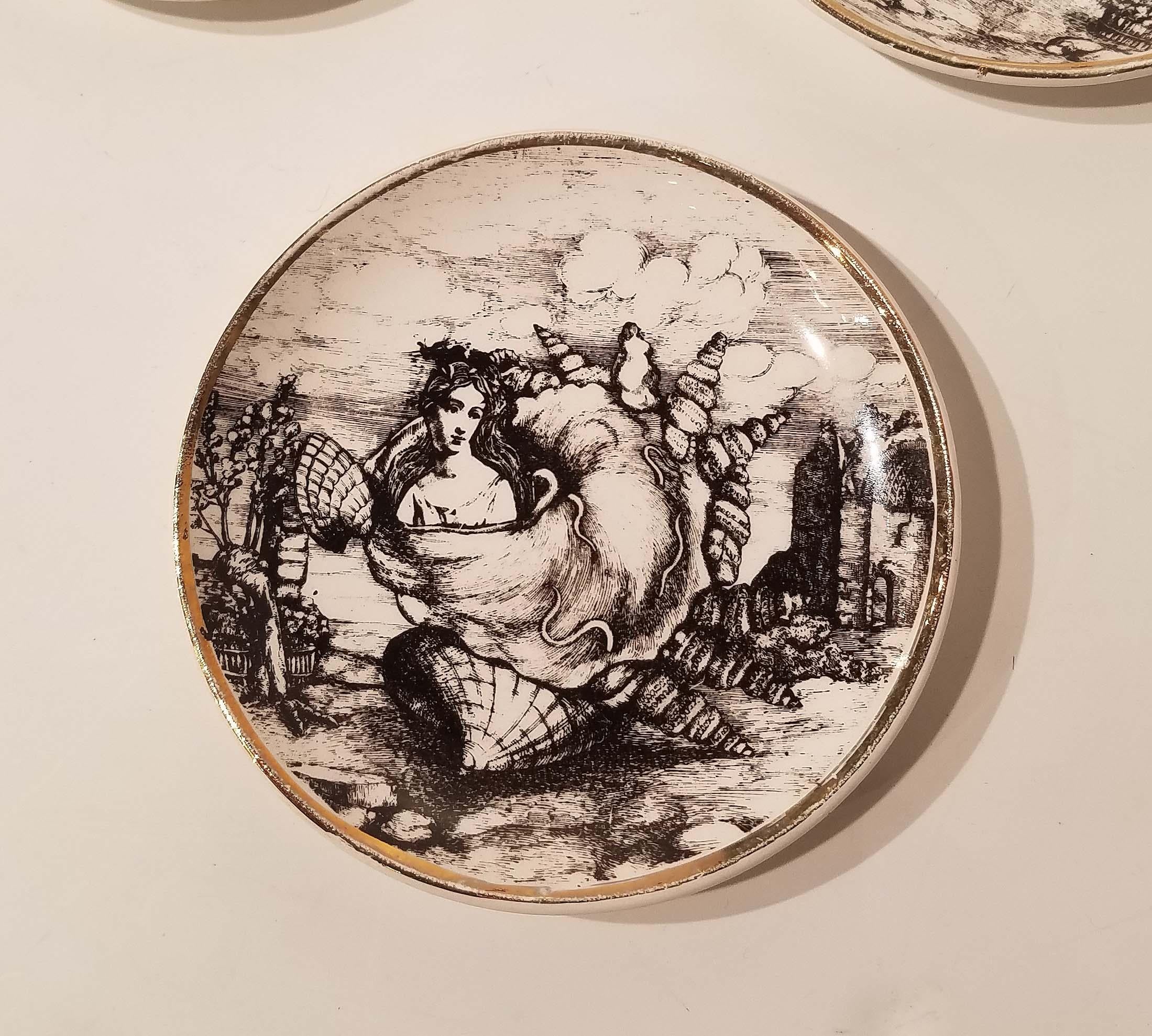 Piero Fornasetti (1913-1988)
A Set of Six 'Conchyliorum' Coasters, 1950s
lithograpically-decorated and gilt porcelain, with original box
each 4 in. (10 cm.) diameter
each marked FORNASETTI MILANO MADE IN ITALY FOR ROSENFELD IMPORTS.
 