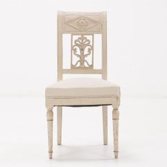 A set of six French Directoire style painted dining room chairs, 19th C.