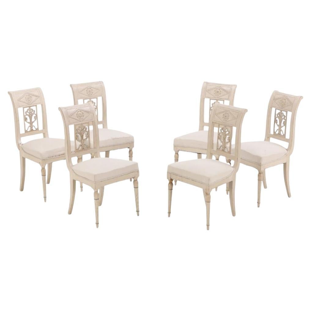 Juego de seis sillas de comedor pintadas al estilo del Directorio francés, S. XIX.