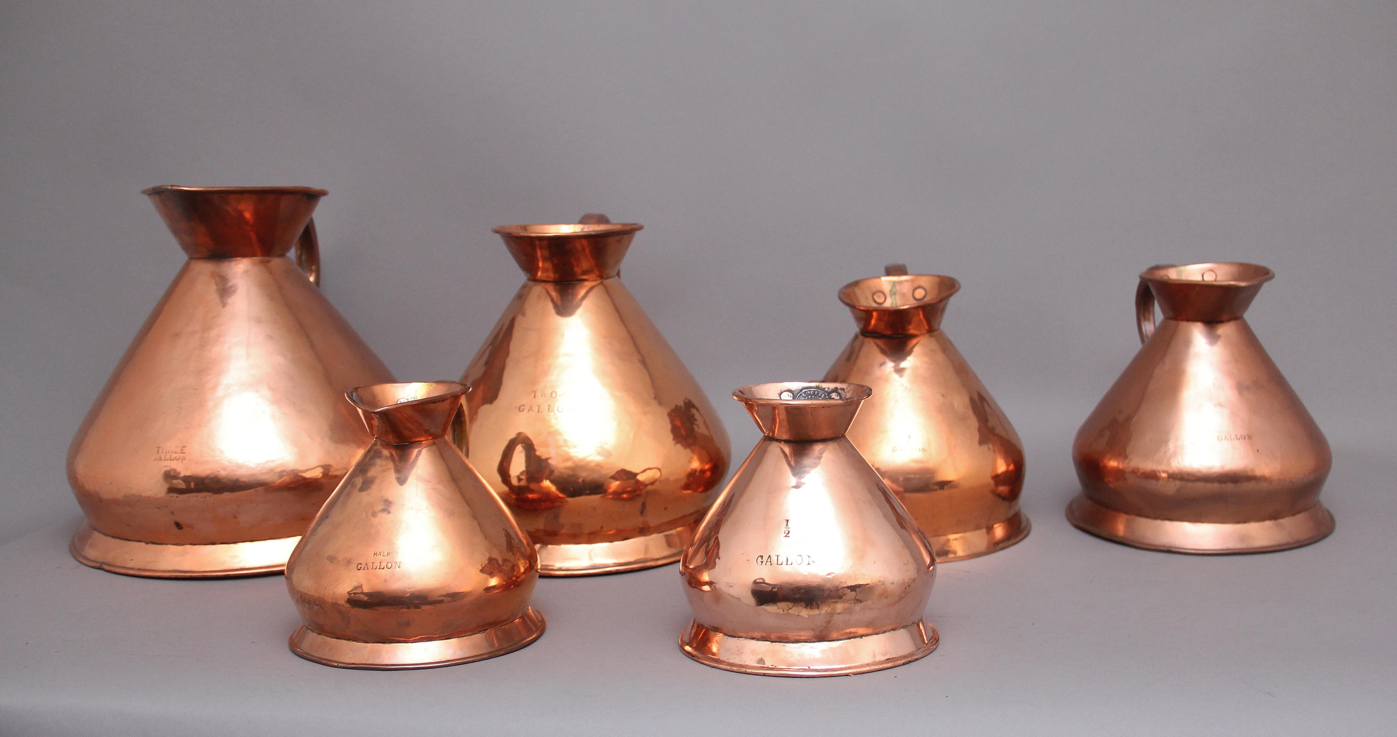 A set of six highly decorative 19th Century copper measuring jugs In Good Condition For Sale In Martlesham, GB