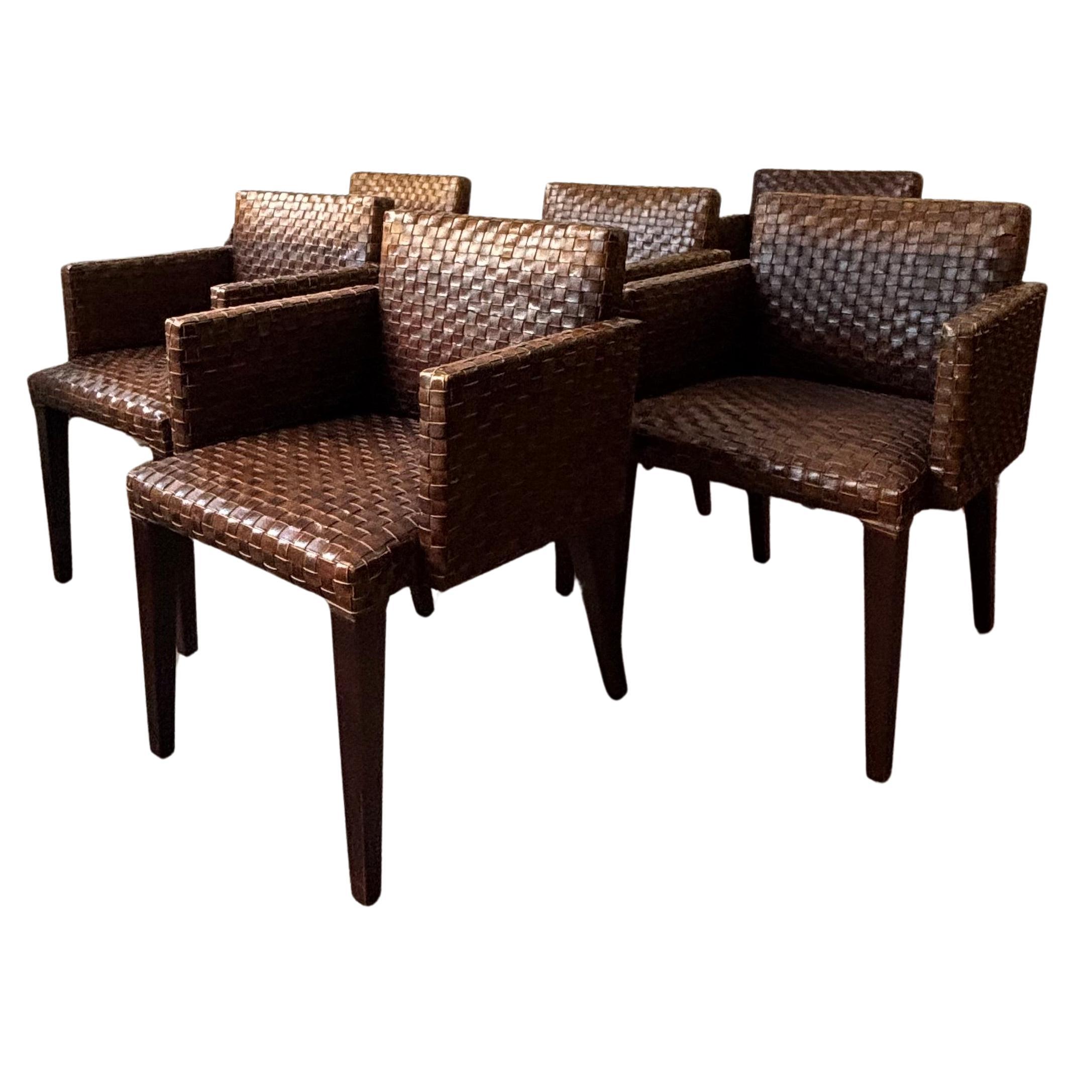 A Set of Six Italian Chairs With Woven Leather Covers
