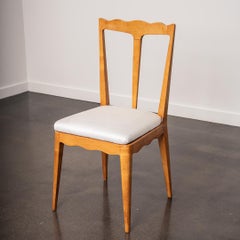 A Set of Six Italian Sculptural Dining Chairs