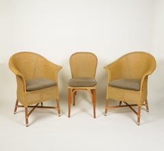 A Set of Six Lloyd Loom Wicker Dining Chairs