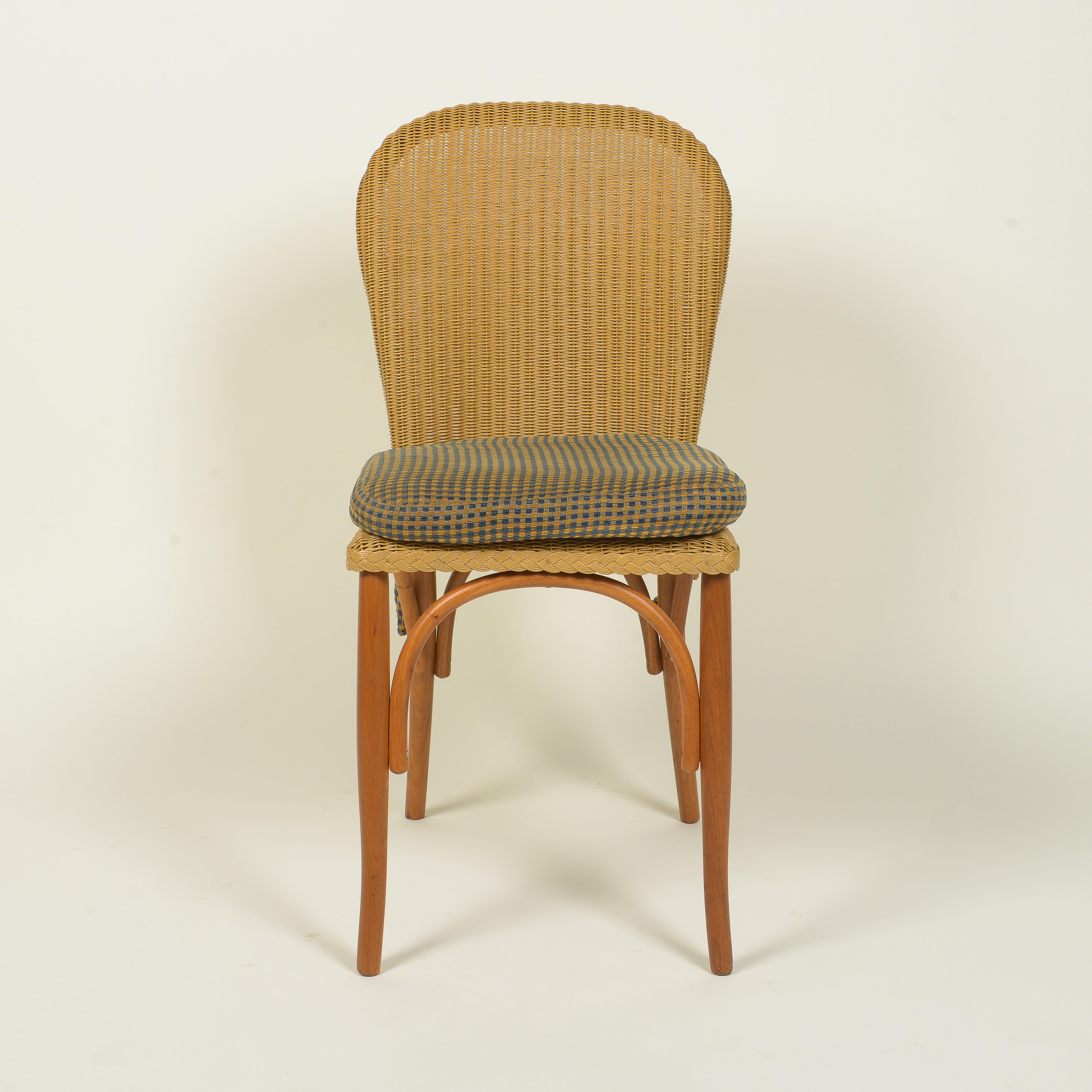 20ième siècle Ensemble de six chaises de salle à manger Lloyd Loom en osier en vente