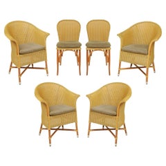 A Set of Six Lloyd Loom Wicker Dining Chairs
