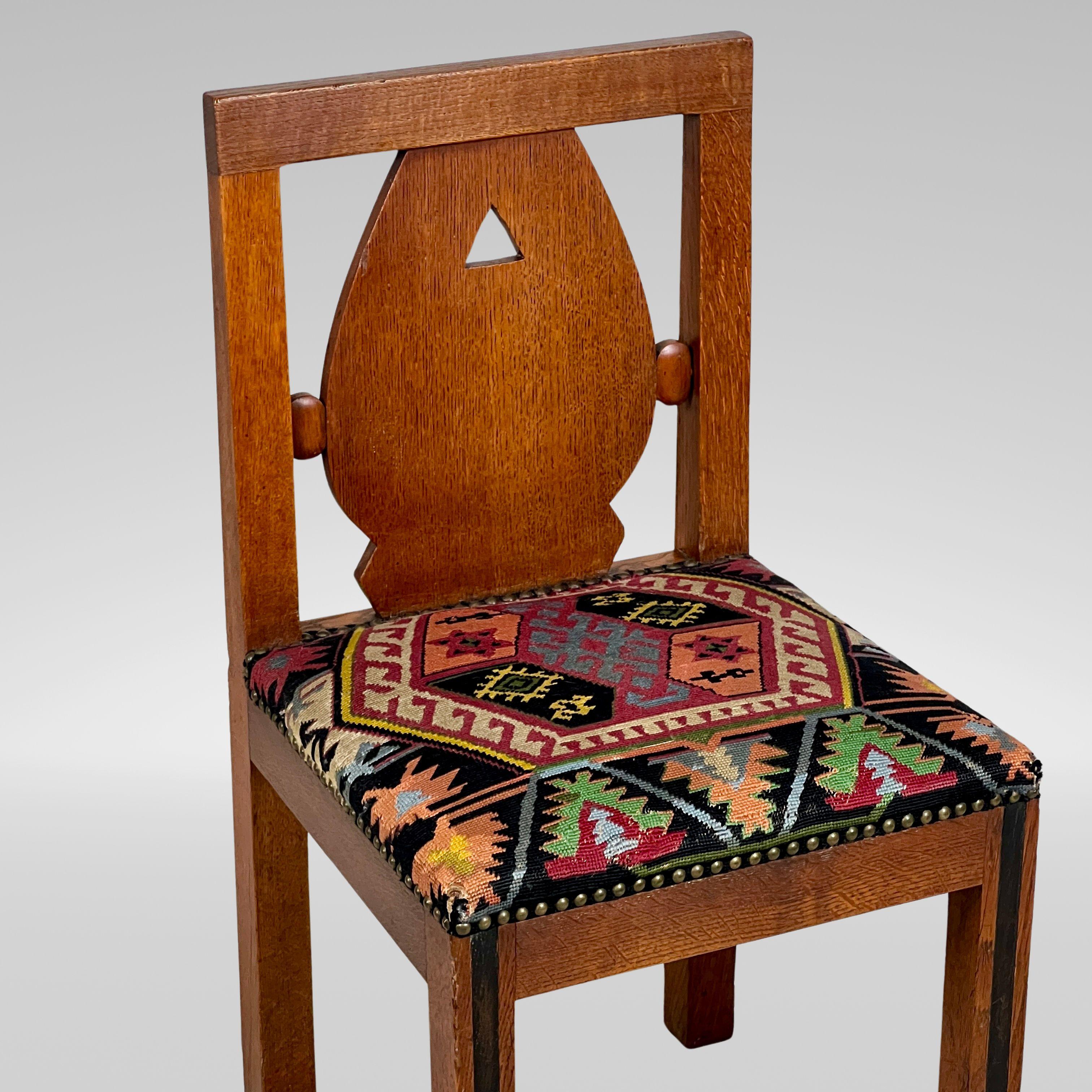 A Set Of Six Oak Art Deco And Kilim Dining Chairs 1