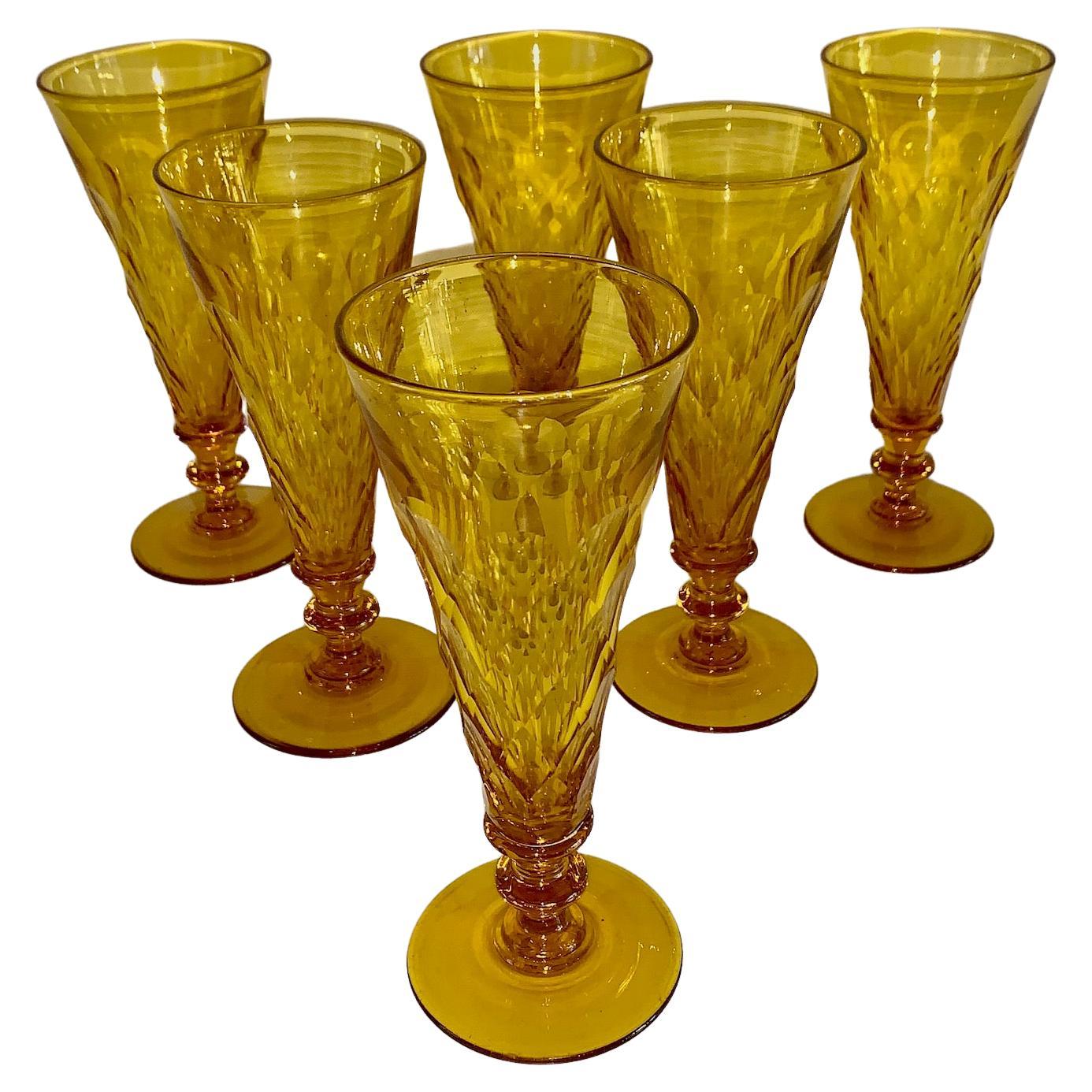 A set of Six  Rare Canary Yellow Champagne Flutes by Steuben