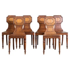 A Set of Six Regency Mahogany Hall Chairs