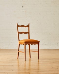 A set of six scalloped dining chairs attr. to Paolo Buffa