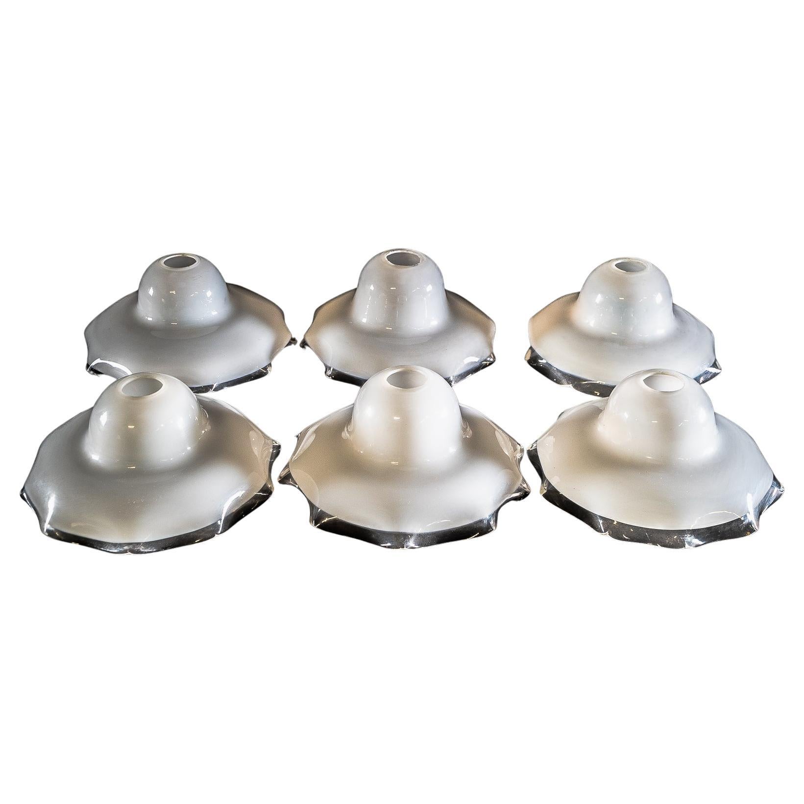 A Set of Six Vaseline Glass Shades with an Opalescent Finish & Ruffled Rims