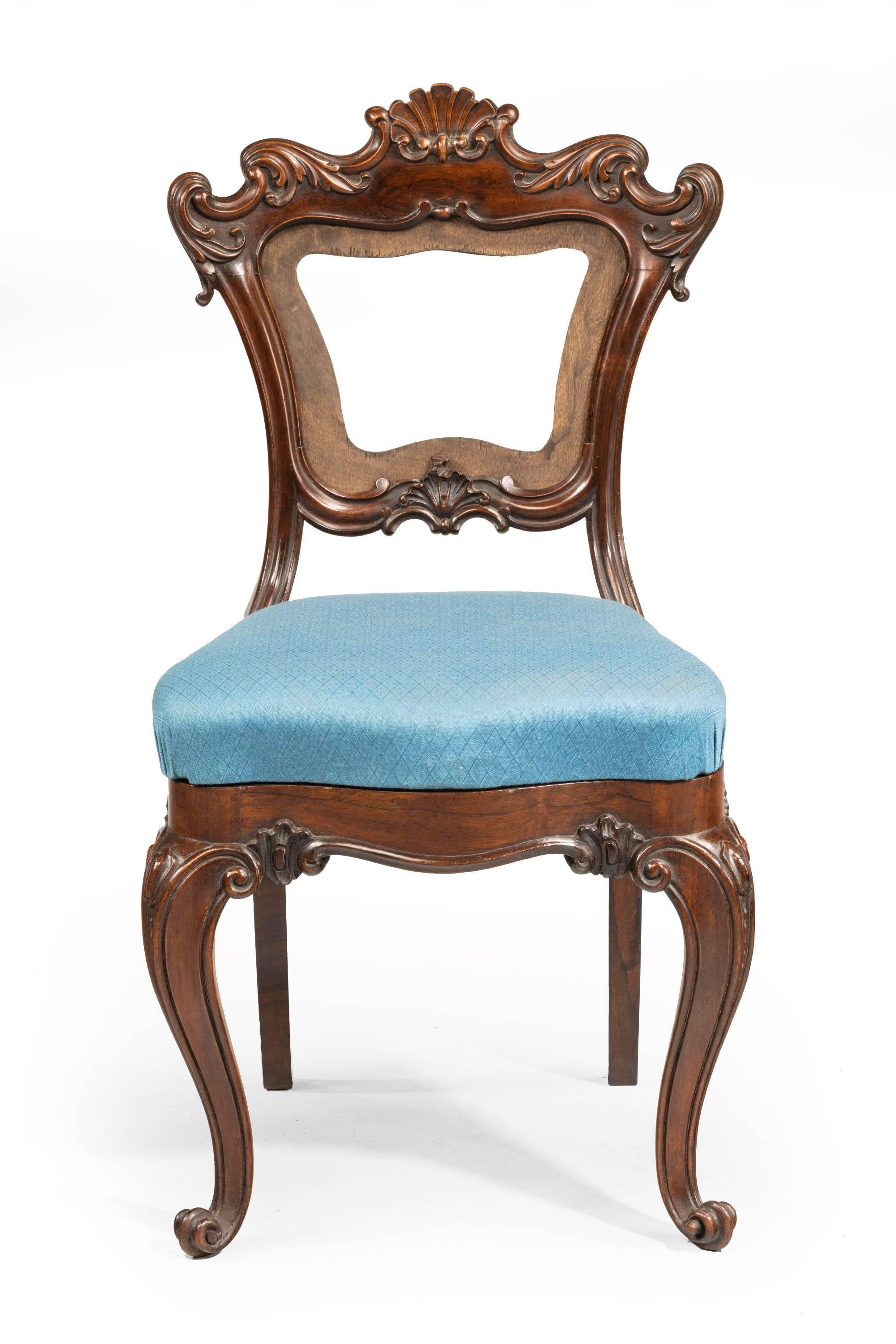 A set of early Victorian mahogany chairs of quite an elaborate form. On strong cabriole supports with wavy serpentine seats. The backs originally upholstered now need recovering.