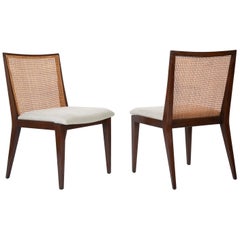 A Set of Six Walnut and Caned Dining Chair designed by Edward Wormley