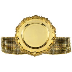 A Set of Thirty Nine Victorian Silver-Gilt Dessert Plates