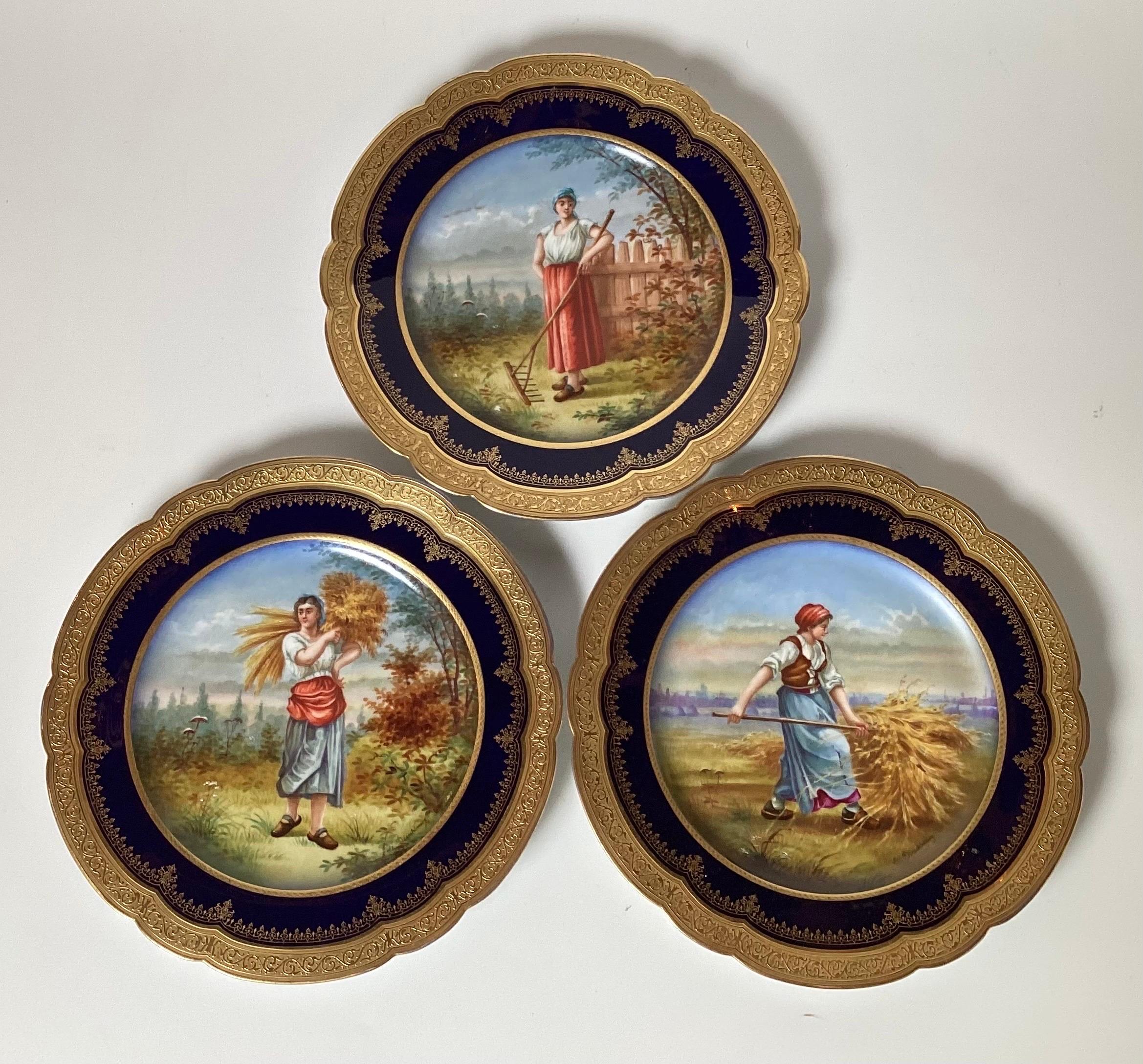 Three Sevres Gilt Heightened Porcelain Cabinet Plates, Mid 19th Century. With scalloped edges, gilt heightened and cobalt border, each with female farmers to the center and signed 'Ch. Dieschbourg' lower right. Crowned 'LP' monogram mark and 1844
