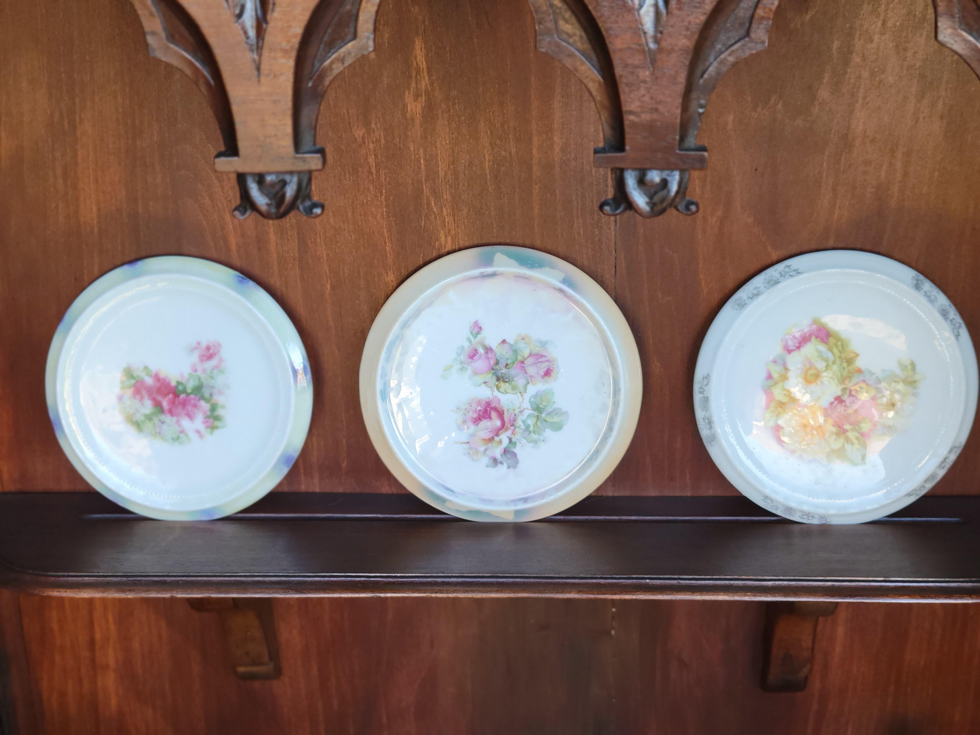 A set of (3) antique German porcelain tea / coffee pot trivets.
Each plate is a 6.5' in diameter and about 1