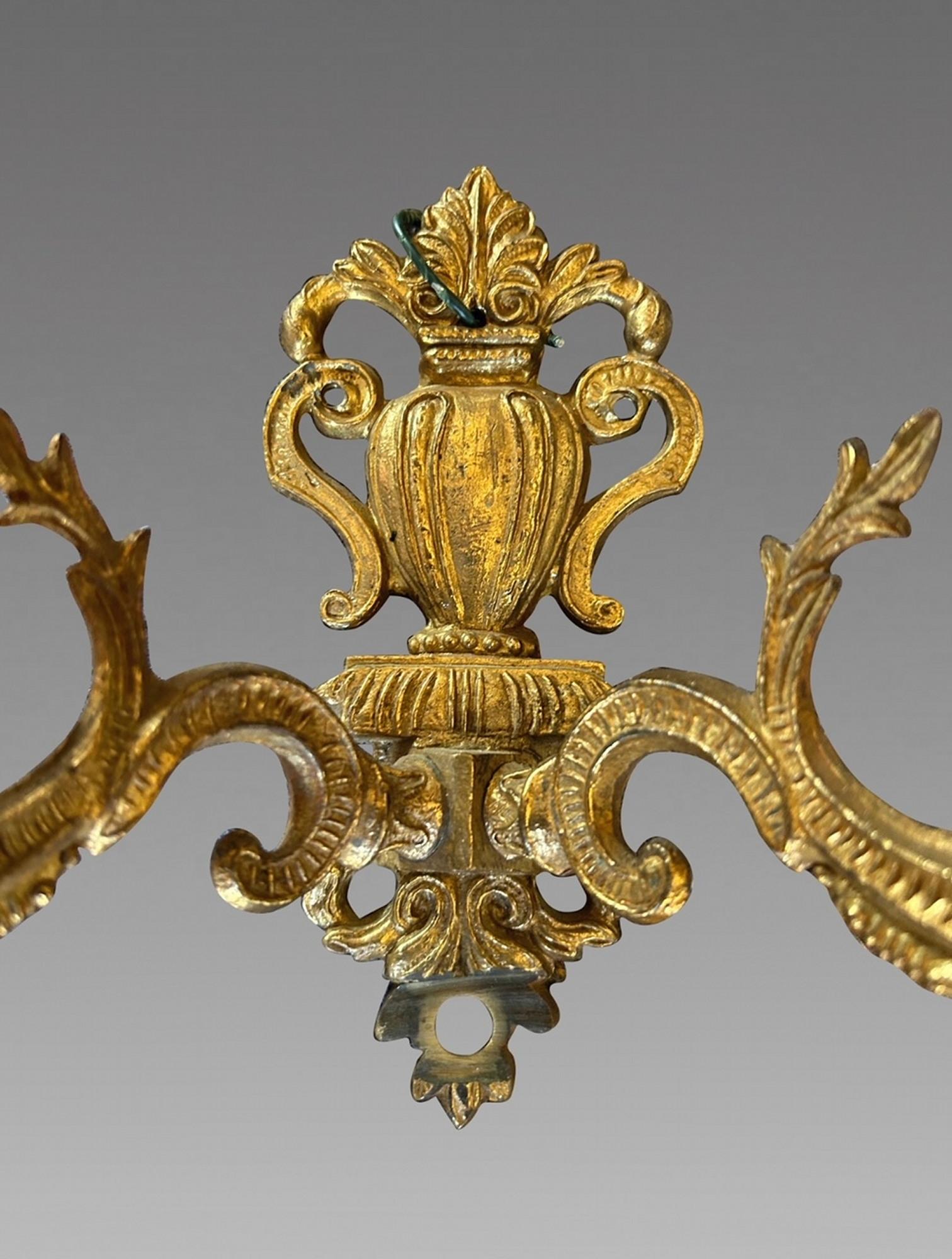 Mid-20th Century A set of three brass mid-C20th European two branch wall lights For Sale