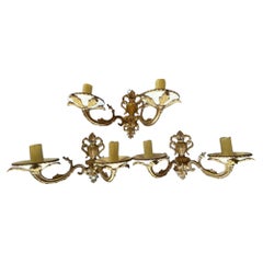 A set of three brass mid-C20th European two branch wall lights