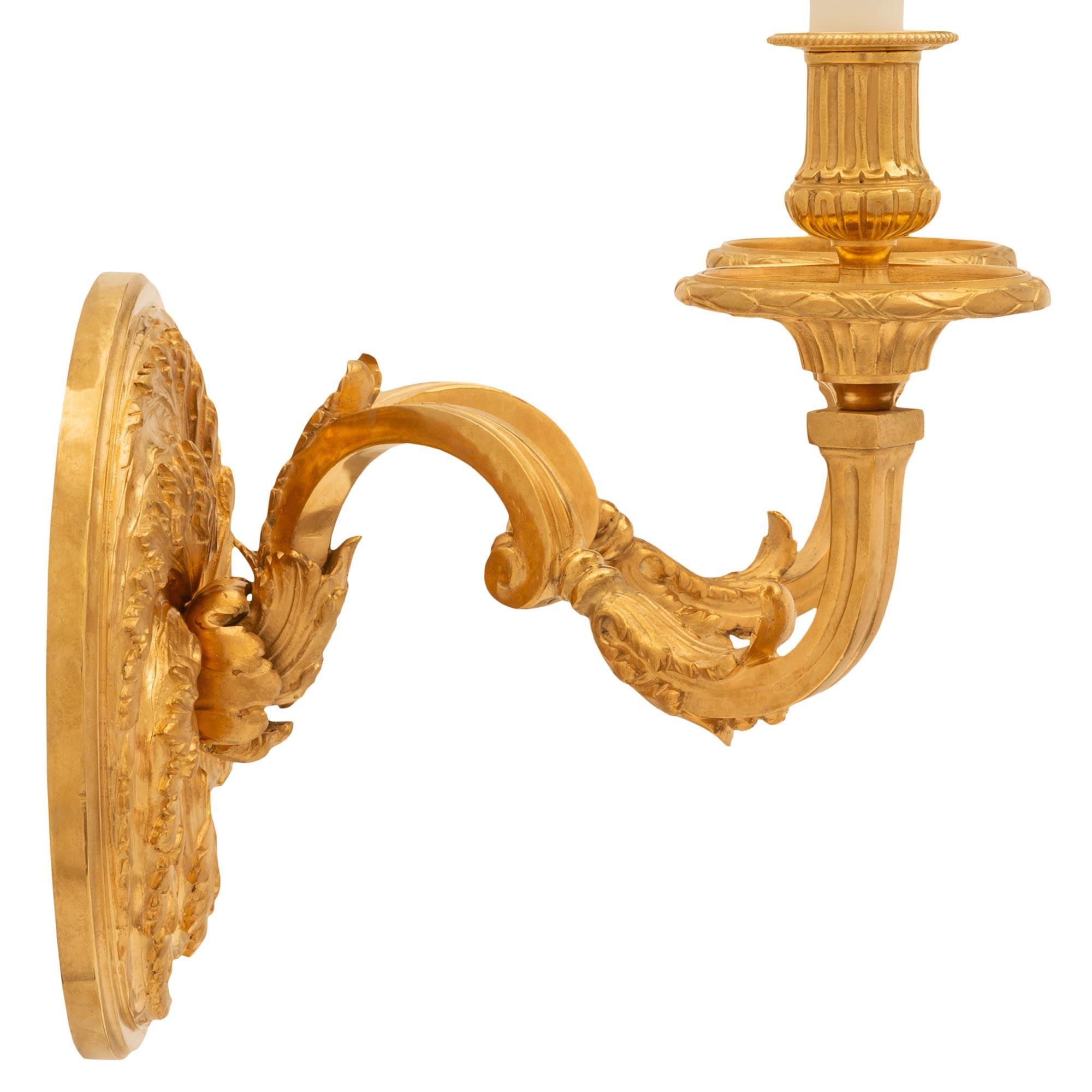 Regency A set of three French 19th century Regence st. Ormolu sconces For Sale