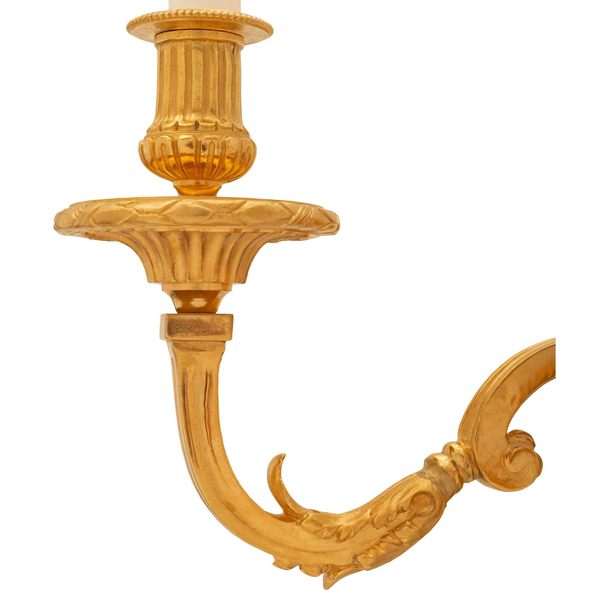 19th Century A set of three French 19th century Regence st. Ormolu sconces For Sale