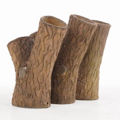 A set of three French tabletop faux bois cast stone planters, C. 1950.