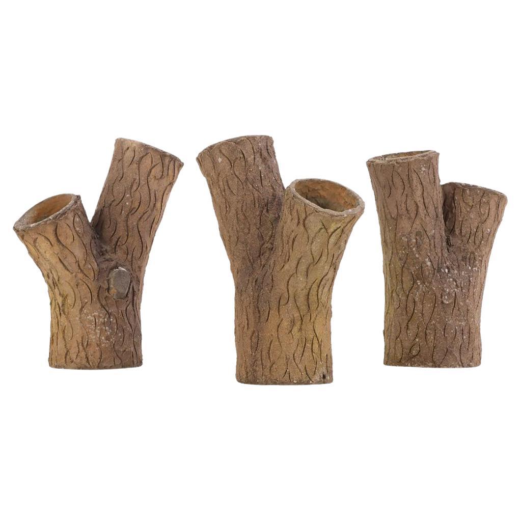 A set of three French tabletop faux bois cast stone planters, C. 1950. For Sale