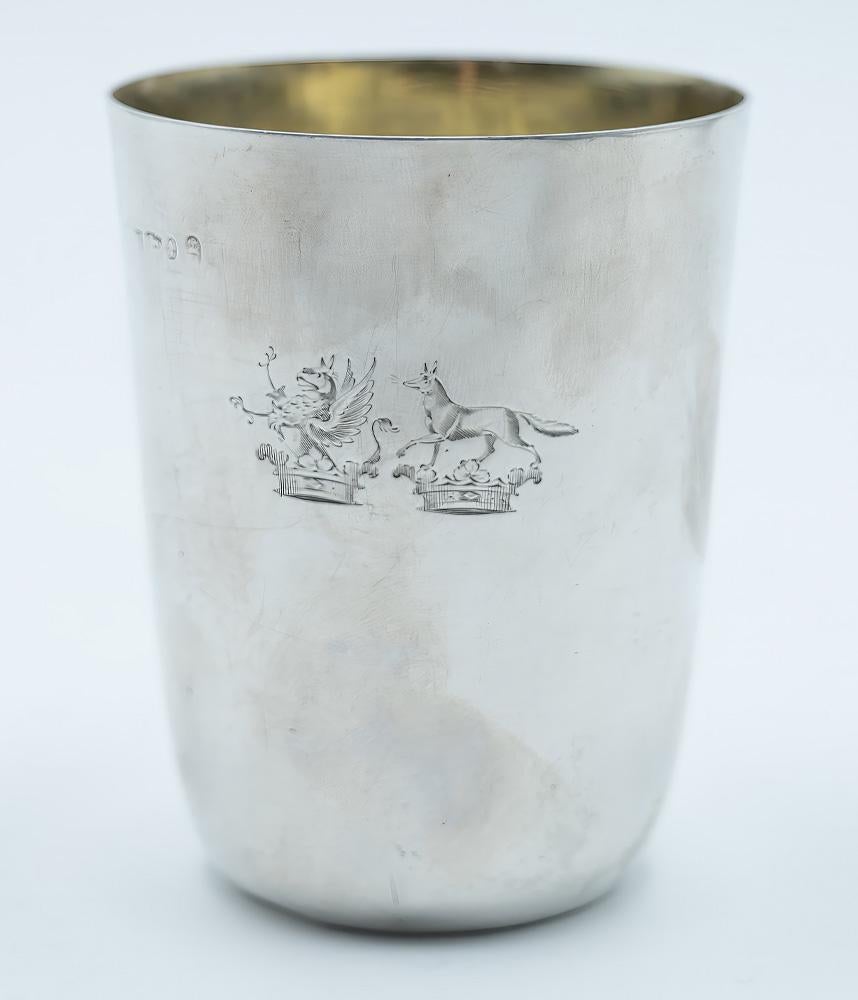 An elegant and finely executed set of three George III period silver nesting beakers, crafted in London circa 1800. Each beaker fits snugly within the other, forming a compact and practical ensemble that reflects both refined taste and functional