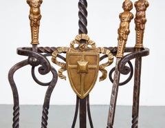 A Set of Three Gilded Age Fireplace Tools in Stand
