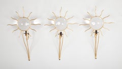 Ensemble de trois appliques en métal doré conçues par Andrea Dubreuil