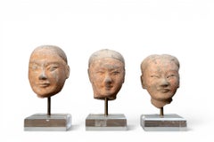 A Set of Three Han Dynasty Funerary Soldier Figure Heads