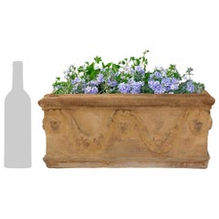 A set of three Italian early 19th century Neo-Classical st. Terra Cotta planters