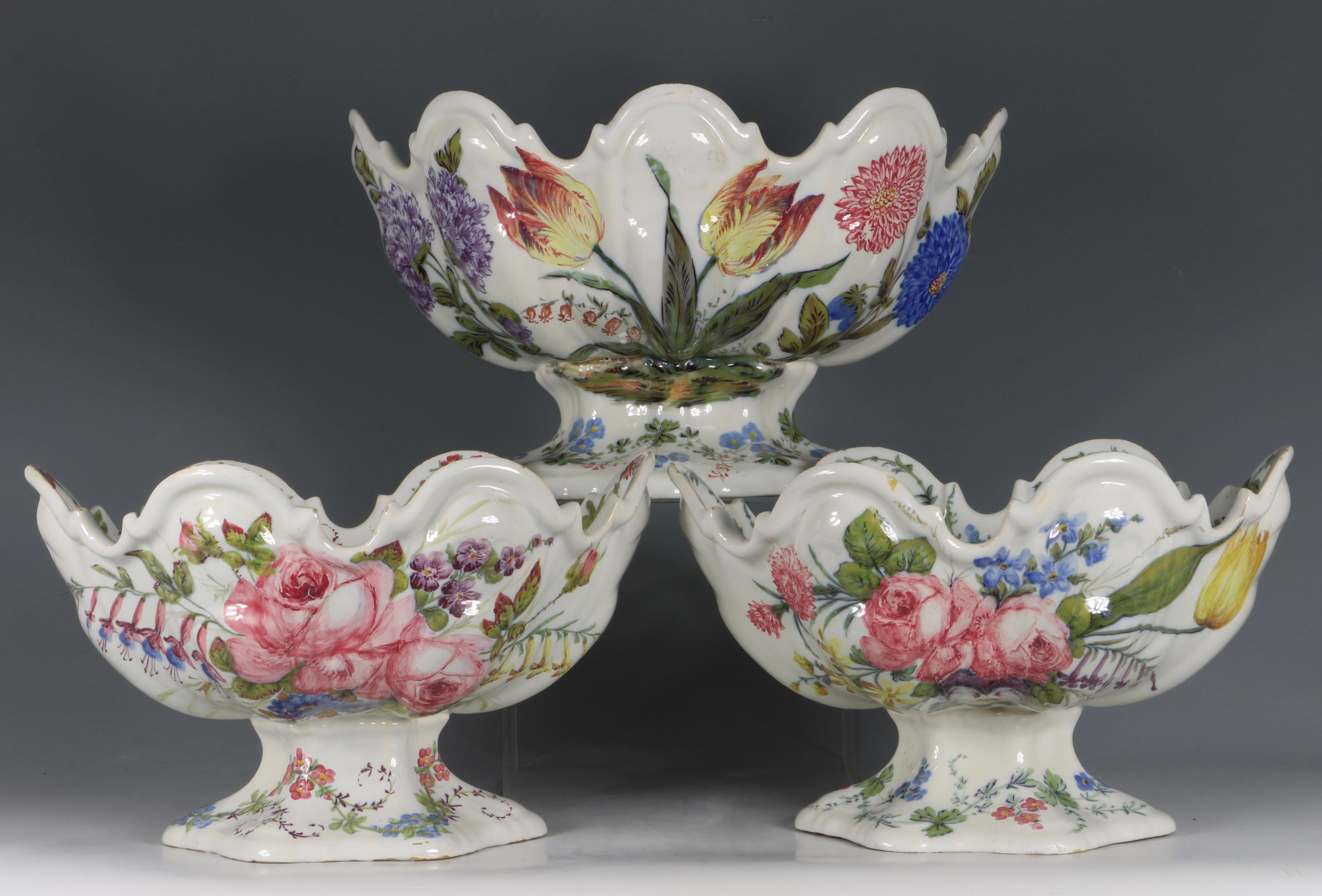A Set of Three Nove Faience Monteiths.

Each very well painted with various bouquets of flowers

Italian Nove, mid-19th century

The largest is 11 1/4? (28.6 cm)

The smaller pair are 9 1/2? (24.3 cm).