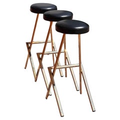 A set of three postmodern bar stools by Martin, late 20th century
