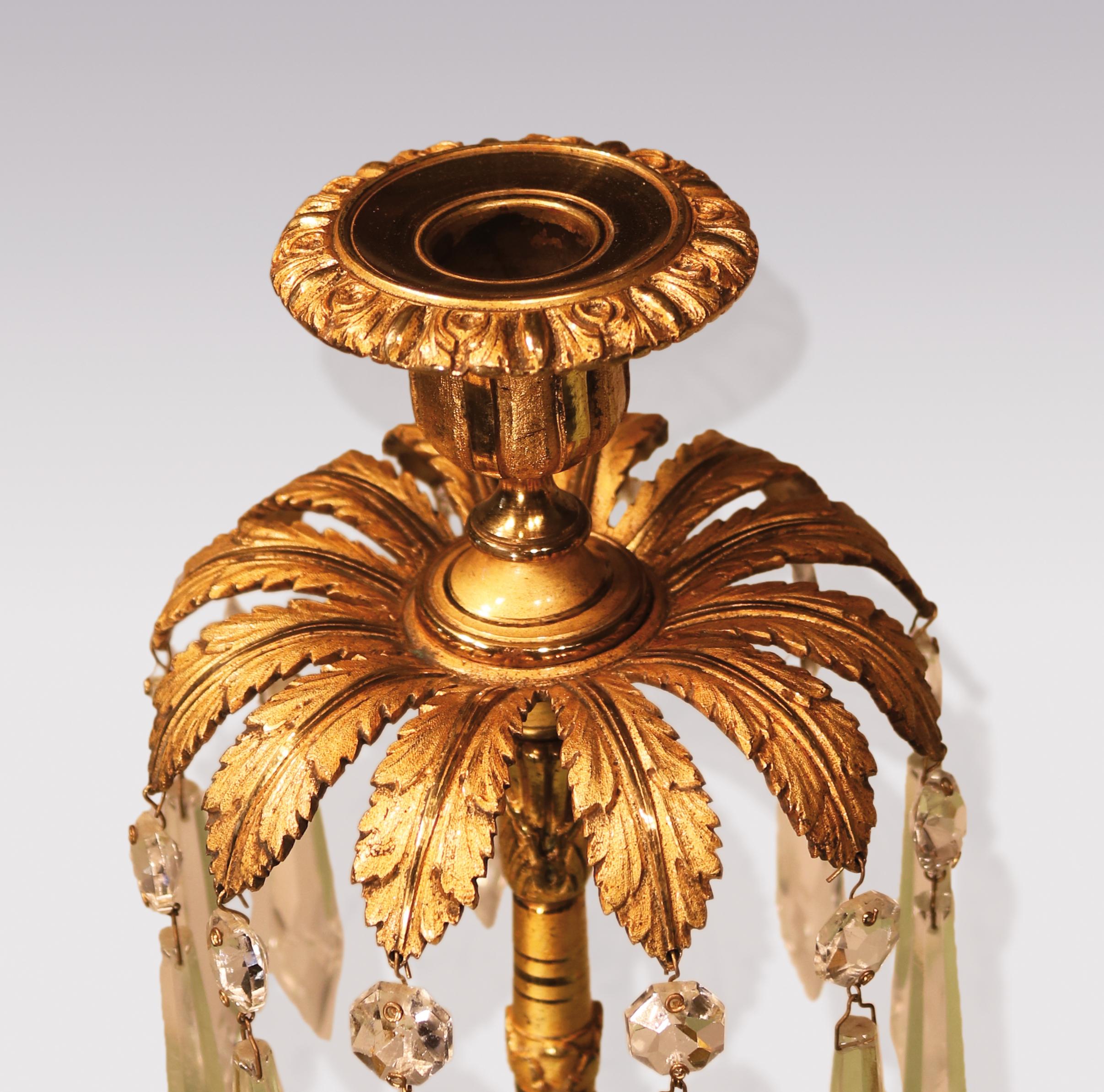 19th Century Set of Three Regency Period Bronze and Ormolu Candlesticks For Sale