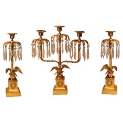 Set von drei Kerzenständern aus Bronze und Goldbronze aus der Regency-Periode